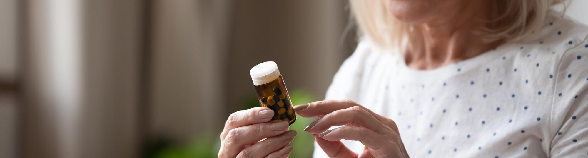 woman checking prescriptions